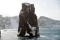 03C Steep Rock Spike Guards The Neptunes Bellows Narrow Opening To Deception Island On Quark Expeditions Antarctica Cruise Ship.jpg